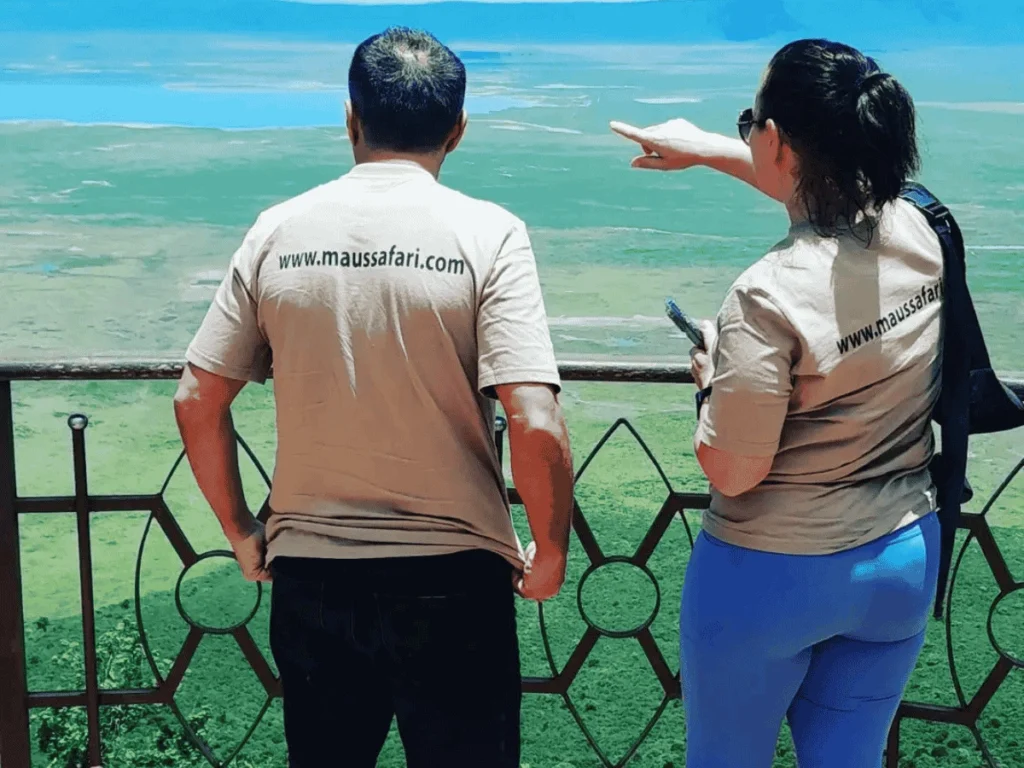 Two people look at the Ngorongoro Conservation Area.