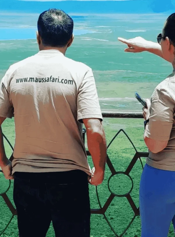 Two people look at the Ngorongoro Conservation Area.